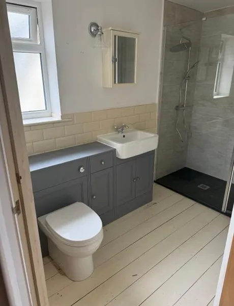 Bathroom with a walk-in shower and fitted vanity unit – bathroom fitting for homes in Havant