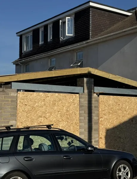 Extension under construction with steel beams, block piers and a timber roof – extension building for homes in Fareham