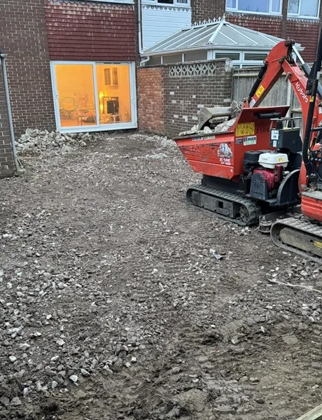 Garden groundworks with a tracked dumper clearing the site – groundworks for homes in Hayling Island