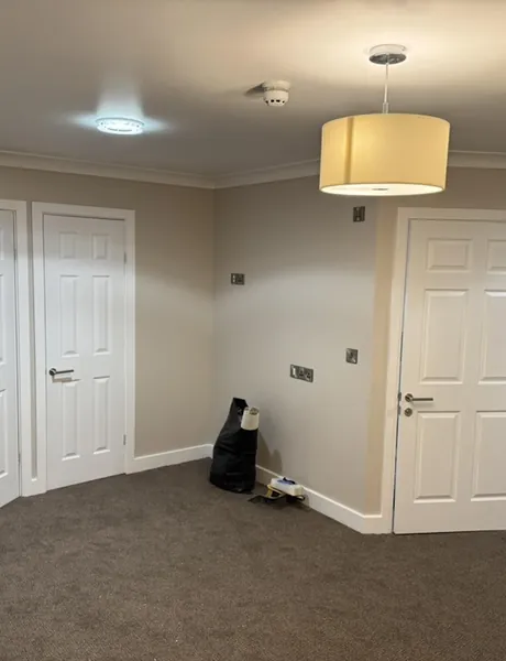 Refurbished hallway with panel doors, coving and new carpet – hallway refurbishment for homes in Fareham