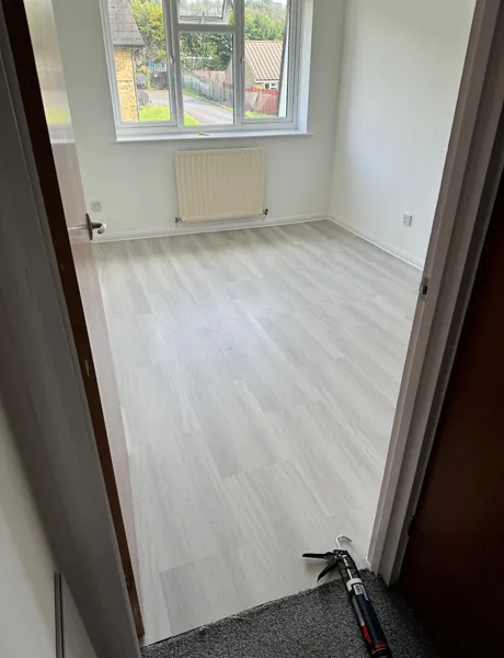 Luxury vinyl tile flooring fitted in a bedroom – LVT flooring for homes in Fareham