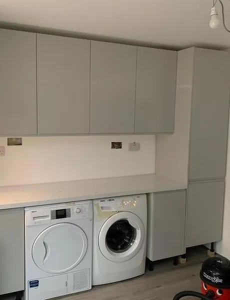 Utility room with fitted units, washing machine and tumble dryer – utility room fitting for homes in Horndean